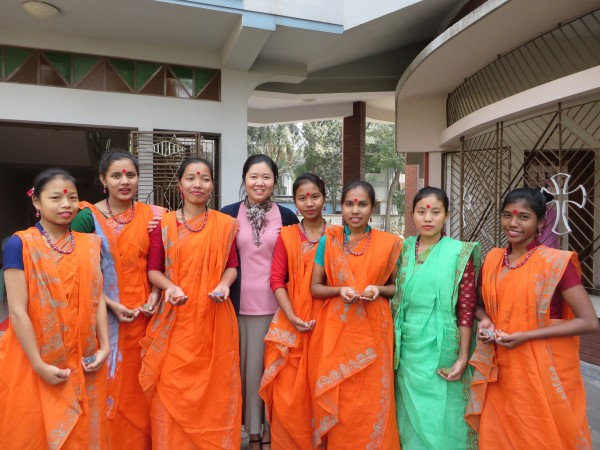 New candidates in their traditional dress for a dance